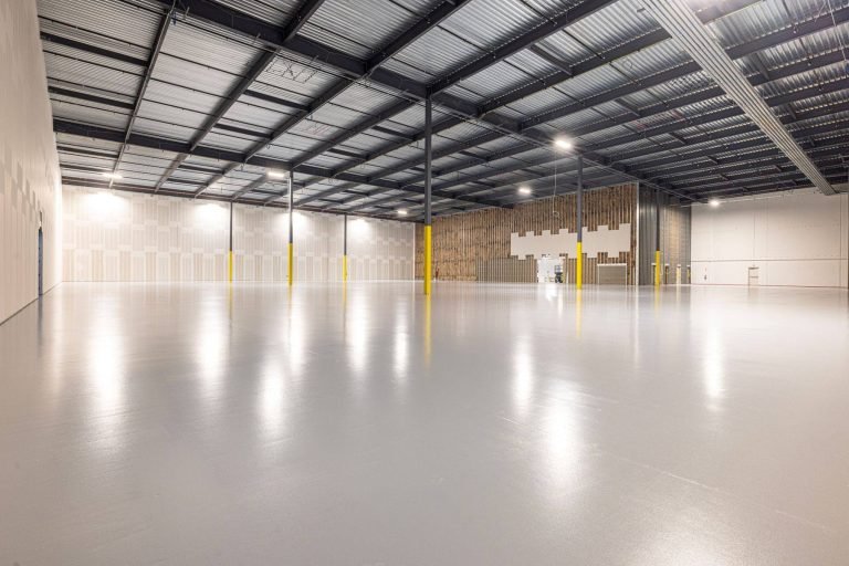 Industrial building interior suitable for commercial spray foam insulation