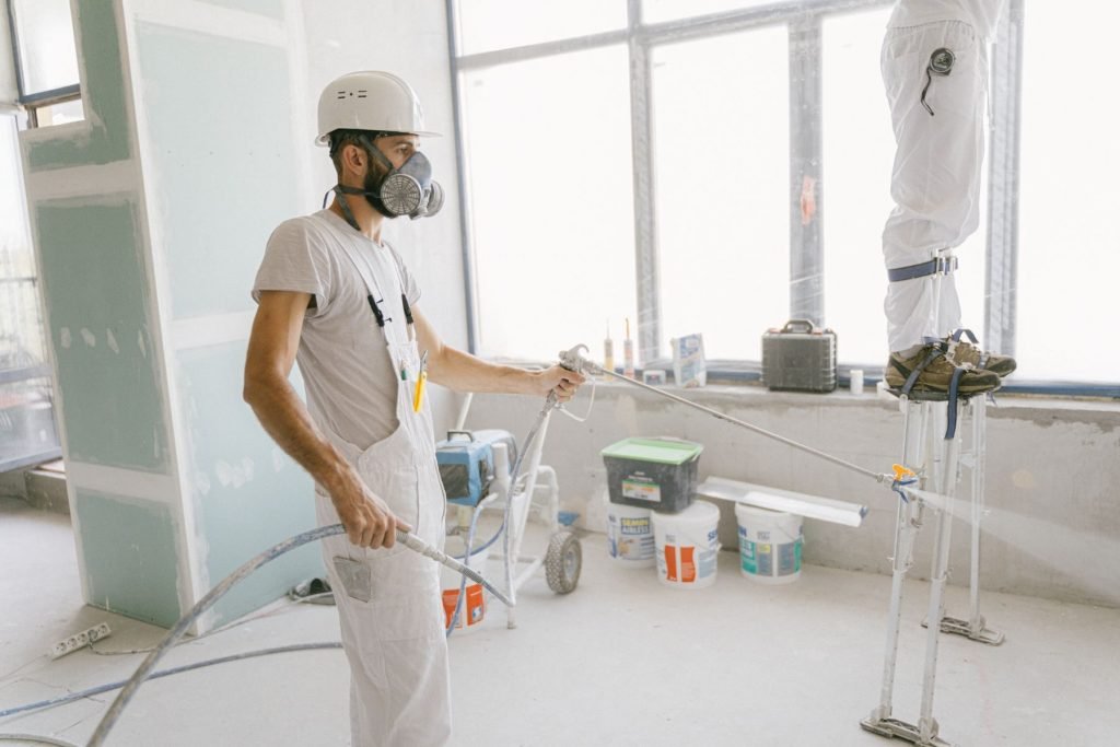 Insulation contractor working on a residential job site in Houston